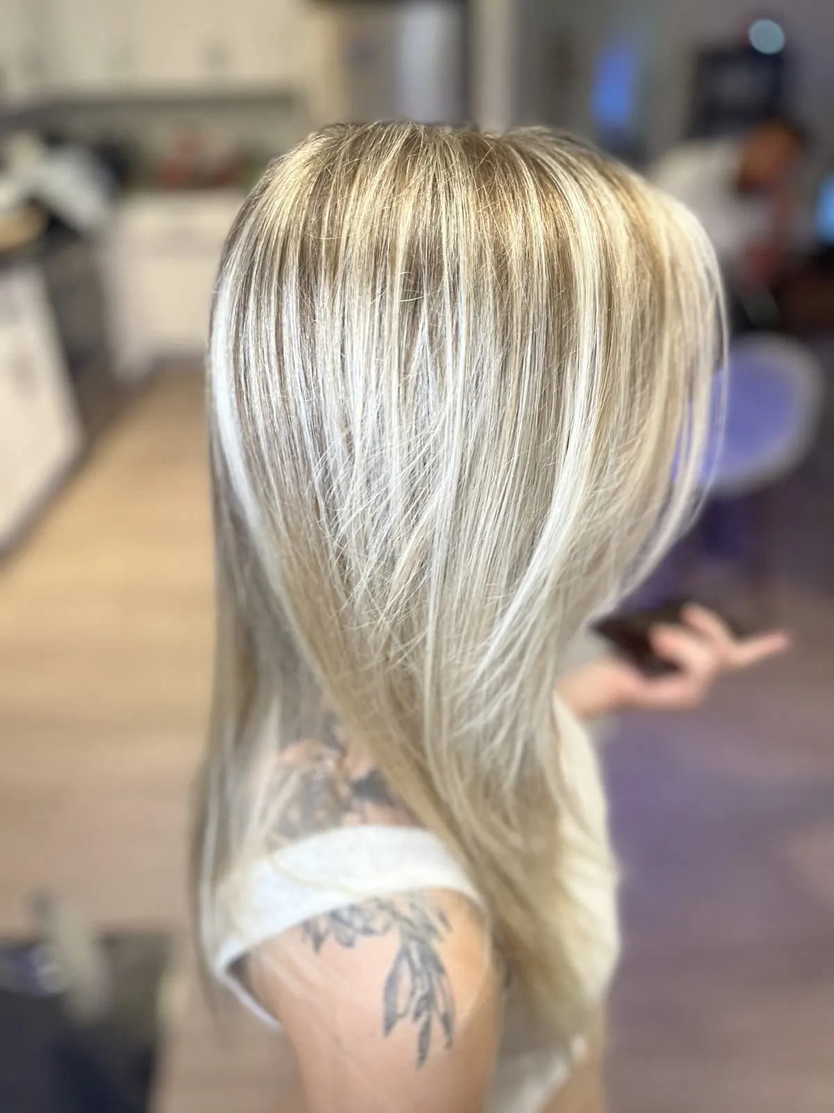 Long blonde balayage hair color in Austin
