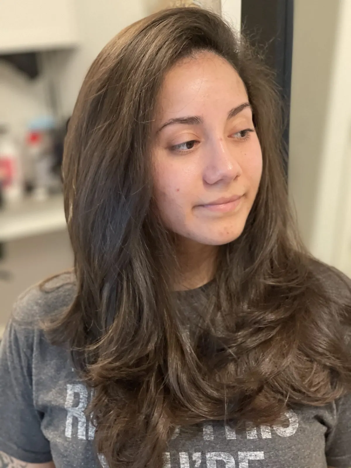 Glossy brunette blowout and style at The Hair Magician