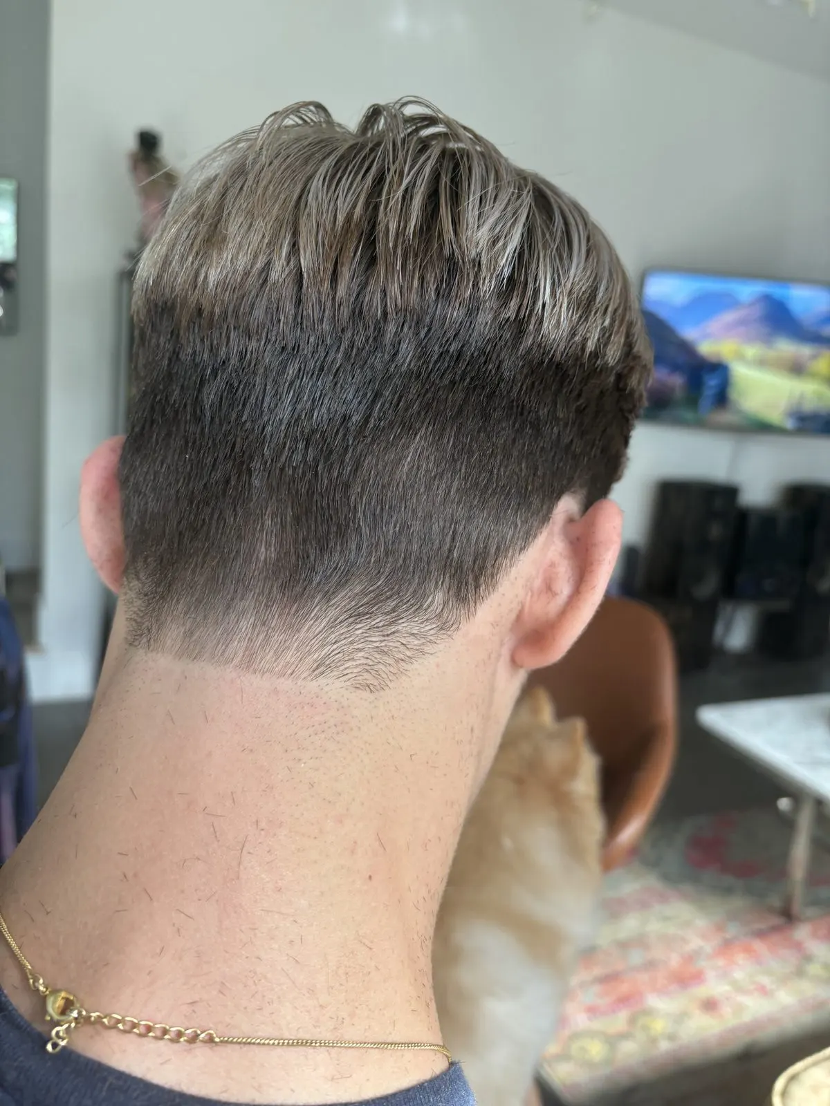 Men's undercut with a sharp fade at The Hair Magician, Austin