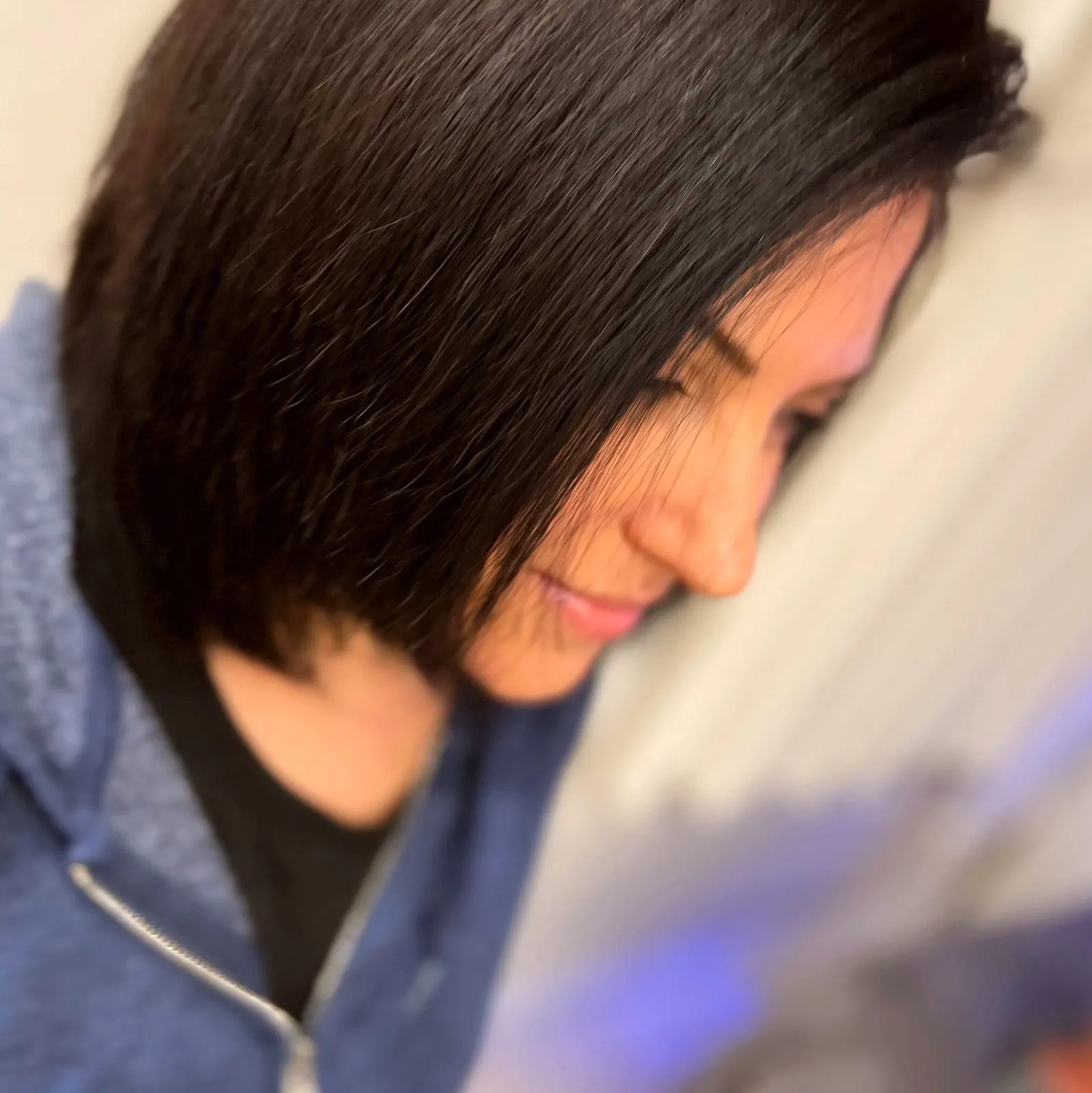 Sleek, straightened dark bob with a keratin-smooth finish, Austin