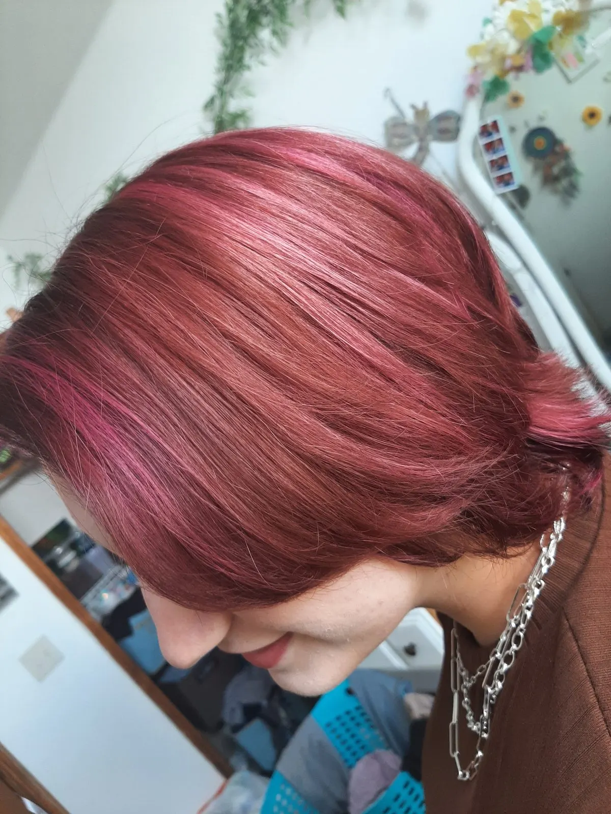 Vivid pink fashion hair color at a North Austin salon